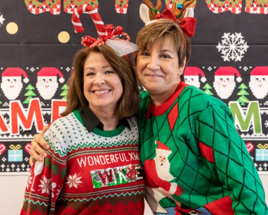 Gina Scott and Kathy Raglin are in the festive spirit.