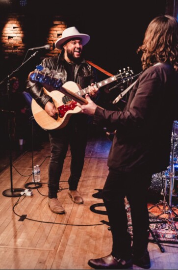 PHOTO BY EMILEE PATRISHKOFF, Simon performing live at one of his favorite venues, 20 Front Street in Lake Orion, with bassist James Simonson and drummer Ron Pan