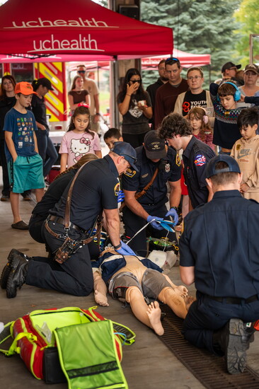 At the Annual Station 5 Open House, Greeley Firefighters, UCHealth EMS, and Aims EMS students perform a cardiac arrest scenario to show the community how vital 