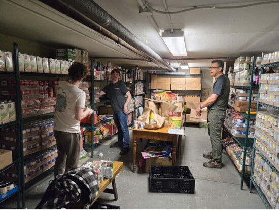 Gorbel volunteers sorting in food pantry