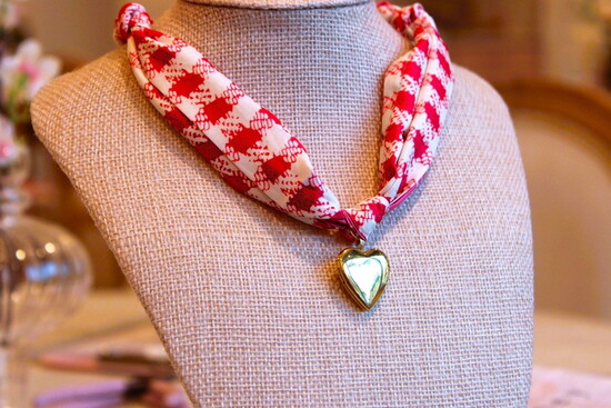 Honey shop's new scarf/charm pairing; photo provided.