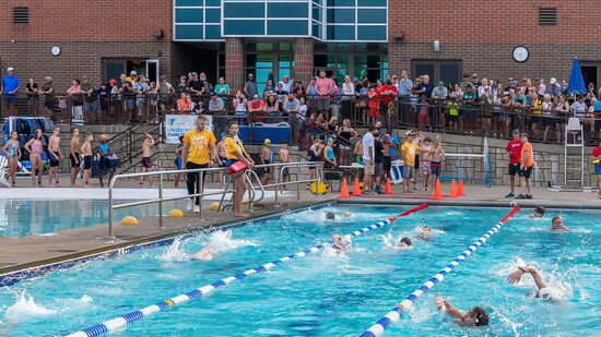 The swim leg of the Kids Triathlon is underway.