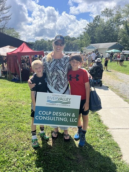 Heather Colp, flanked by her sons, Quin, left, and Jai. 