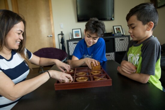 Guests playing a game at Imagine Housing