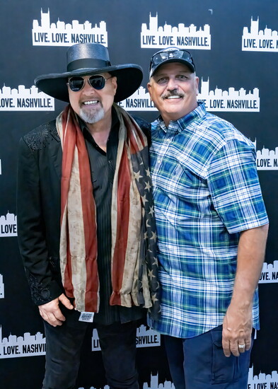 Eddie Montgomery poses with Barry Lee of the Premier Centre.