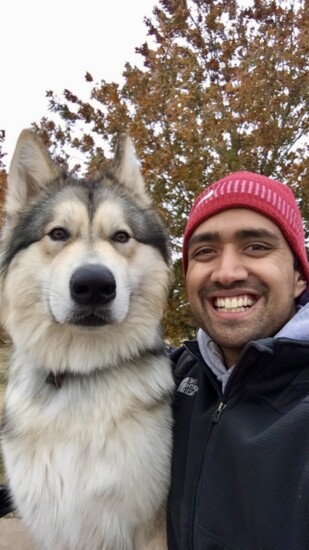 Dr. Fernandes with Leo, his beloved Alaskan malamute