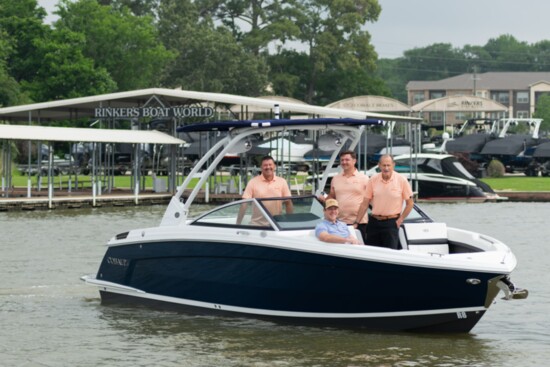 Chris, Mason, Tanner and Jerry are aboard one of their signature brands, a 2024 Cobalt R8 Boat.