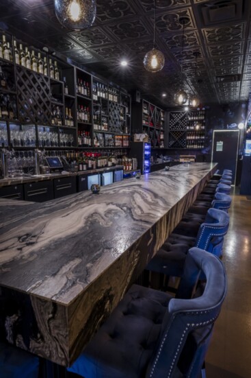Guests and diners enjoy the speakeasy-style vibes at Fuhgeddaboudit Wine Bar & Lounge.  To book a private event, visit wildomarwinelounge.com.