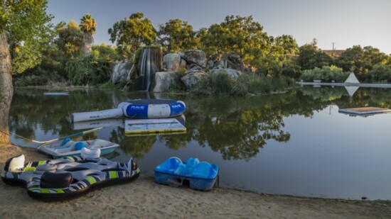 Enjoy the sandy beach at the campground's lake, where you can lounge, play or simply take in the serene surroundings.