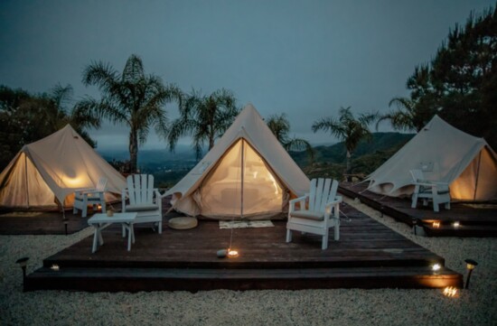 The glamping tents at Sheros Retreat in Temecula come with upscale bedding and beautiful views.  "We call it 'rustic elegance," says Co-Founder Margo Jolly.  