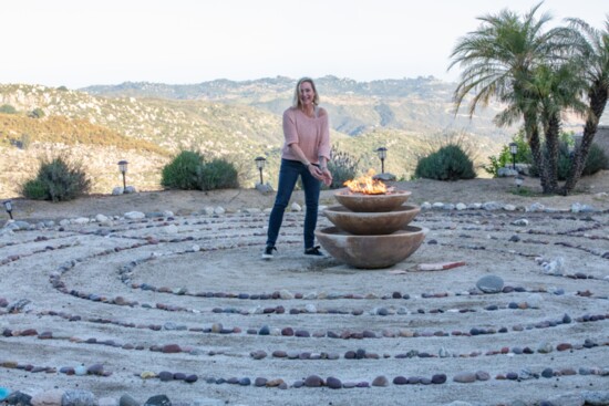 Sheros Retreat Co-Founder Margo Jolly by the labrynth maze at her 20 acre property in Deluz.