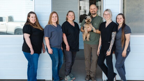 High Desert Veterinary Team (l to r): Haley, Fallon, Amber, Dr. Post holding Tilly, Amanda and Mersadies offer compassionate and quality pet care.  