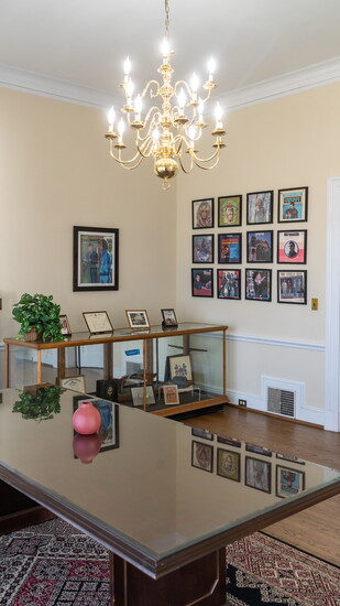 A central meeting space is decorated with music album covers and photos of famous local Sumner County entertainers.