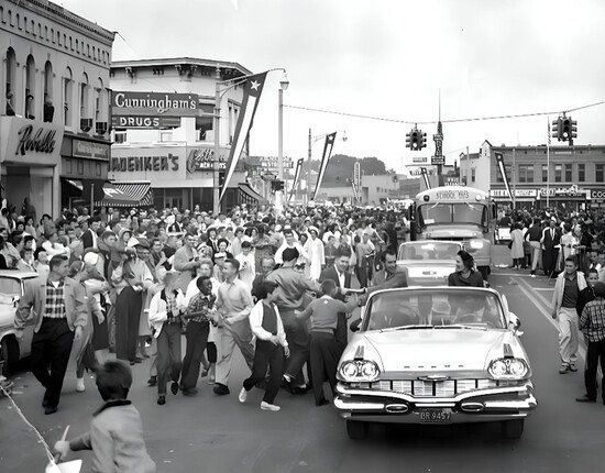 VP Richard M. Nixon and his wife, Patricia, ride along North Gratiot (later North Main) in downtown Mount Clemens during a 1960 presidential campaign stop.