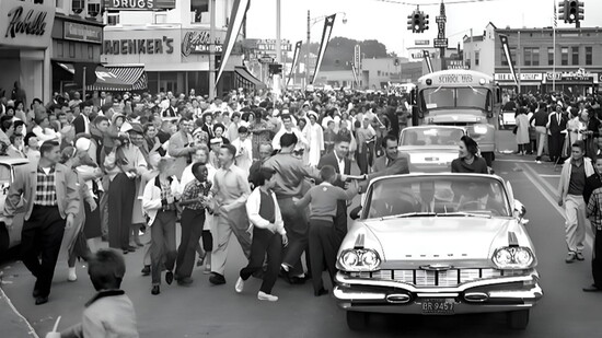 VP Richard M. Nixon and his wife, Patricia, ride along North Gratiot (later North Main) in downtown Mount Clemens during a 1960 presidential campaign stop.