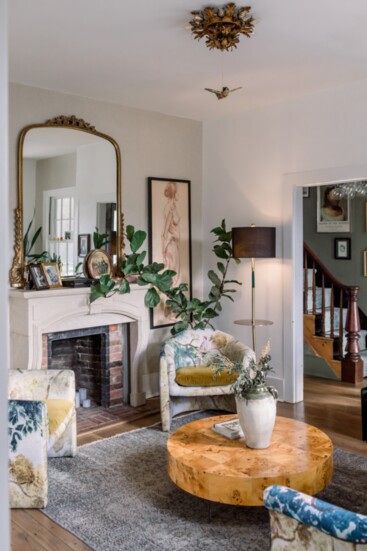 Lillie's living room is in the former dining room, complete with original wood-burning stove.