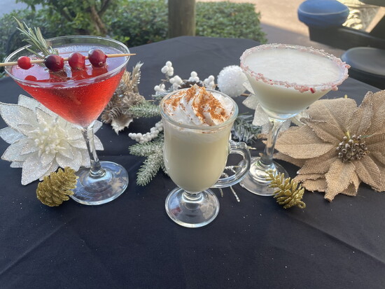 Specialty holiday cocktails at Paradise Grill (l-r) mistletoe martini, ‘naughty’ nog, and a candy cane martini.