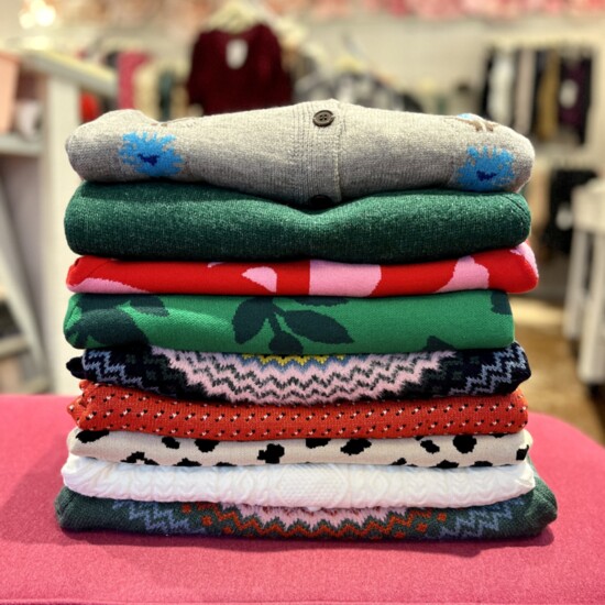 Never Enough Boutique colorful sweaters for everyone fabulous.  51 N. Gore Ave. Webster Groves. Neverenoughstl.com