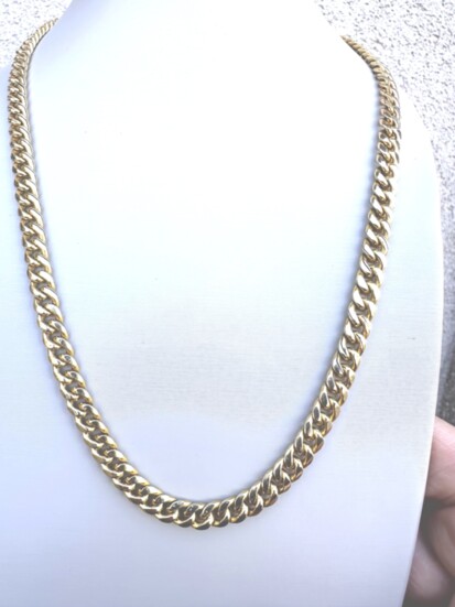 For Him: A classic 14K, yellow gold, 22-inch Miami Cuban solid chain that is 5 MM wide.