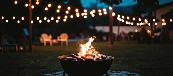 . A firepit with marshmallow roasting sticks
