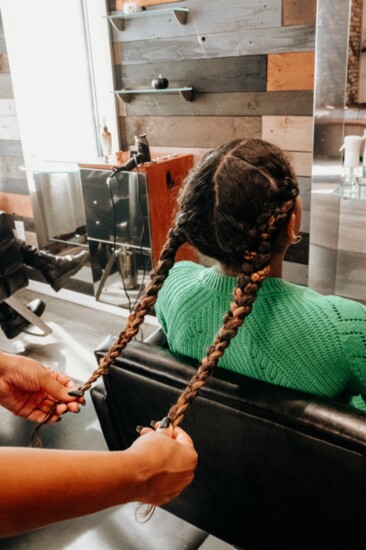 Connect the front braids to the back braids to make it appear like a French braid.