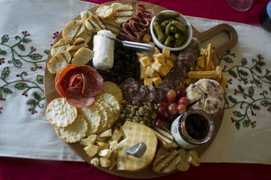 A charcuterie board is perfect for a holiday gathering or even a cozy dinner at home.