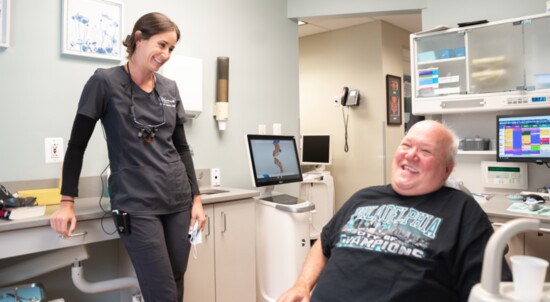 TOP: Dr. Alexa works with a patient