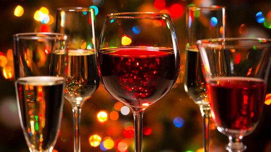 Various wines with festive lights.
