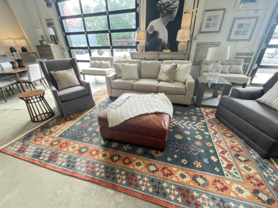 Designer rugs of all sizes, accent throws and chairs dot the showroom. Mix those you love for your own style.