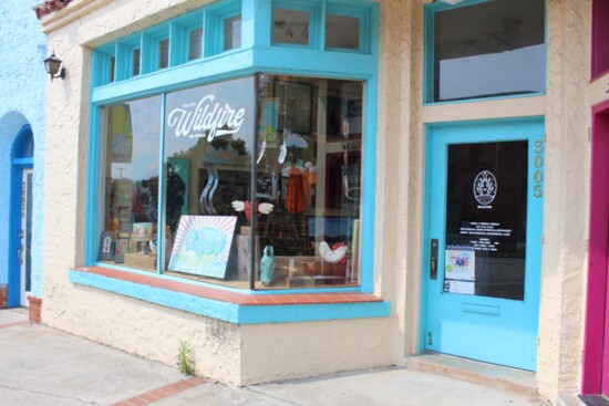 Window display and entrance to Wildfire Gallery, 3005 Paseo St.