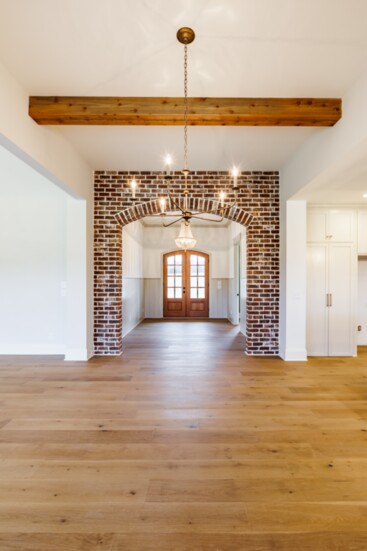 Brick foyer adds a little old with a lot of new for that completely custom feel.