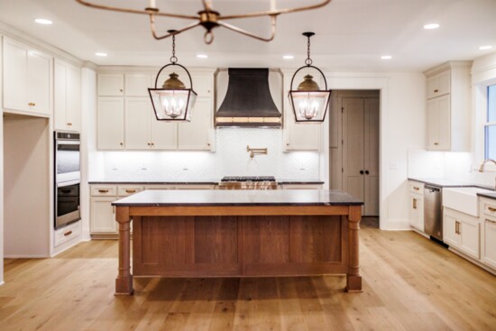 Contrasting island and unique cabinets, along with one of a kind fixtures sets SKC homes apart.