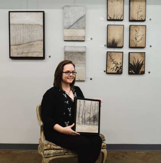 Artist Shauna Martin with her encaustic work at Da Vinci Gallery