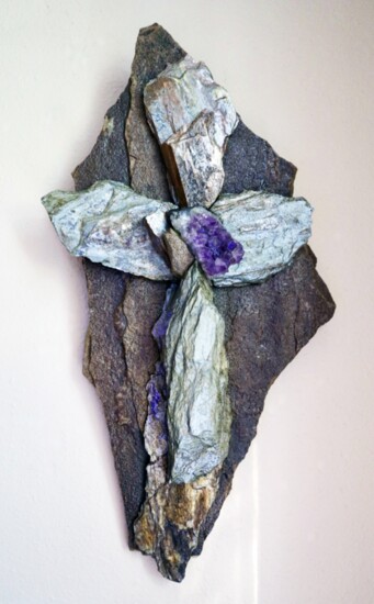 A wall piece, featuring an amethyst center