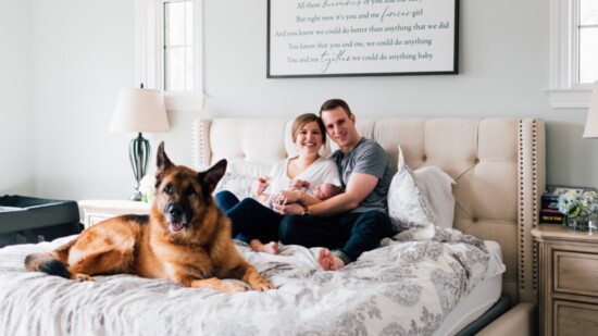 A photographer can help you find locations throughout your home that can make beautiful vignettes. Even the bedroom can be a place for fun family photos.