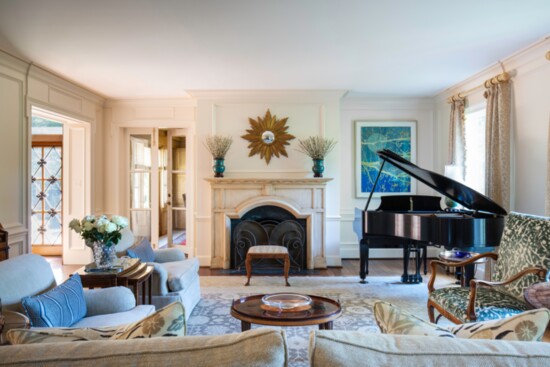 Maysey Craddock artwork and sunburst mirror from France helped refresh this living room.