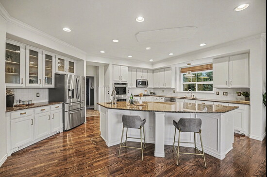 The kitchen provides ample space for daily use and entertaining.
