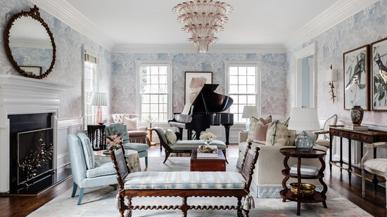 The living room walls are swathed in Cole and Son Nuvole al Tramonto. The antique barley twist bench cushion is covered in a Brunschwig & Fils striped velvet