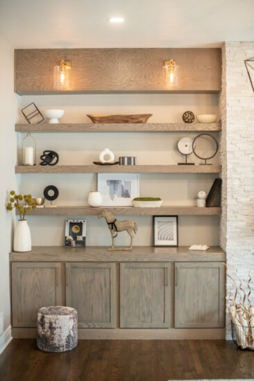 The homeowner is able to display meaningful personal items in the new built-in shelves