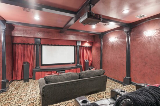 A theatre rooms allows for watching movies safely.