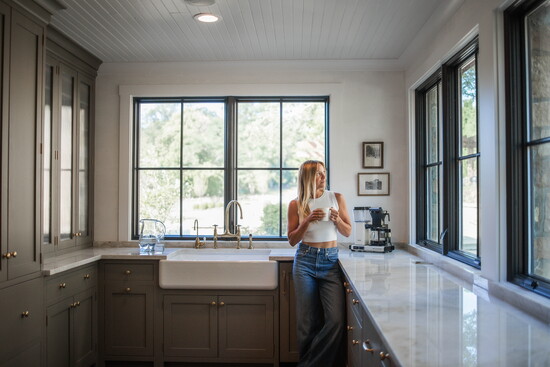 Neutral tones, layered materials, and thoughtful layout make this kitchen equal parts stylish and functional.