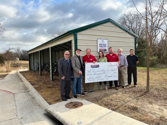 Brandon Tomes Subaru presented The Samaritan Inn with a check for $12,000 to pay for the construction of a new bicycle shelter for The Inn's residents.