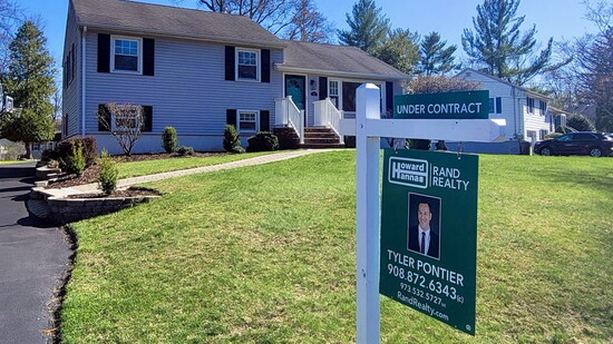 An "under contract" sign outside of one of Tyler's recently sold homes. 