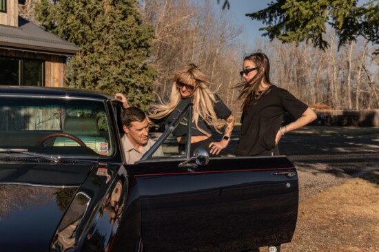 Cameron Richards, custom car builder sharing his passion with a few girls from Pure Barre Bozeman. 
