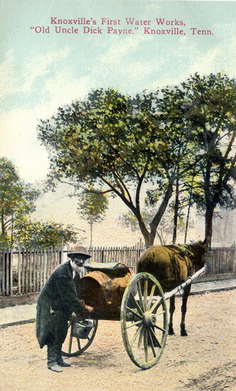 Historic postcard of Water Carrier Dick Payne and his mule (KHP)