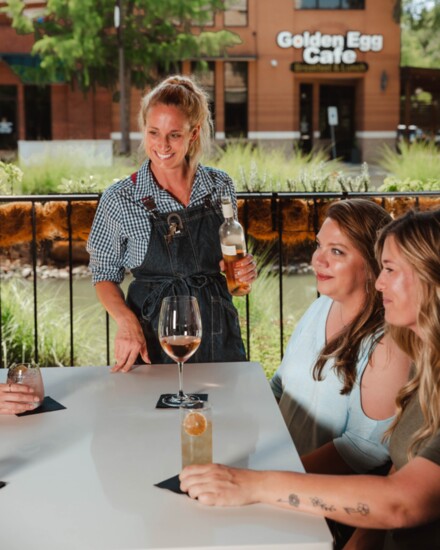 Enjoy a glass of wine with sunshine and a view on the patio at the Barrel.