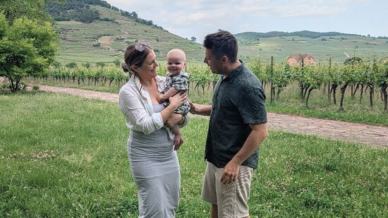Jillian with her husband and son, Junior, at Domaine Weinbach winery in Alsace, France.
