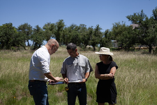 Jonathan Card meets with clients on site