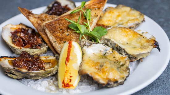 Liberty Kitchen & Oysterette Memorial, Char-Grilled Gulf Oysters. Photo by Heirloom Interactive 