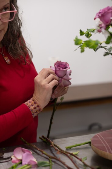 Joyner reflexes her roses to increase their size.